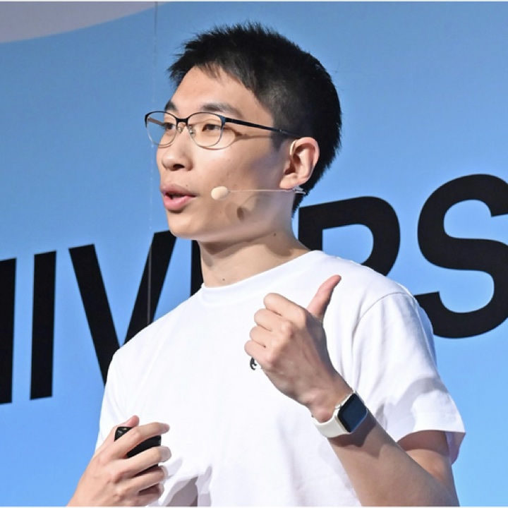 William Zhang speaking at a technology event